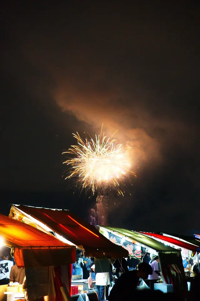 Fireworks above an evening festival in Osaka